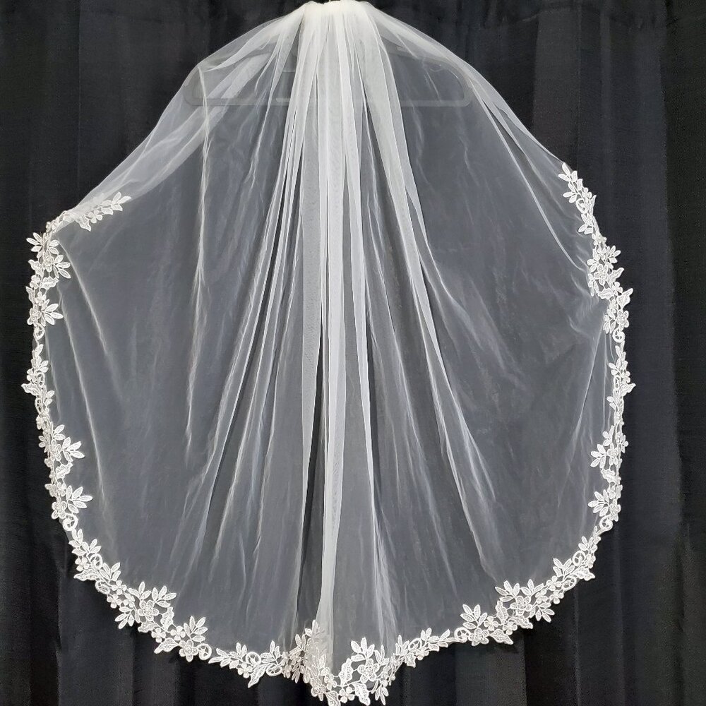 Ivory lace edge fingertip wedding veil with pearl accents